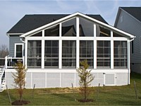 <b>A photo of the finished screened room from the back of the house</b>